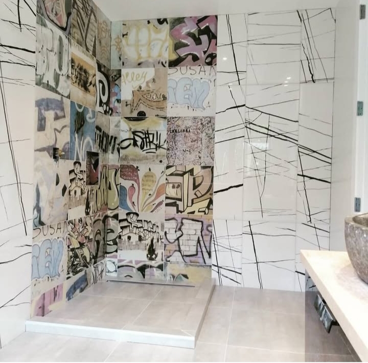 Professional bathroom tiling with waterproof membrane application